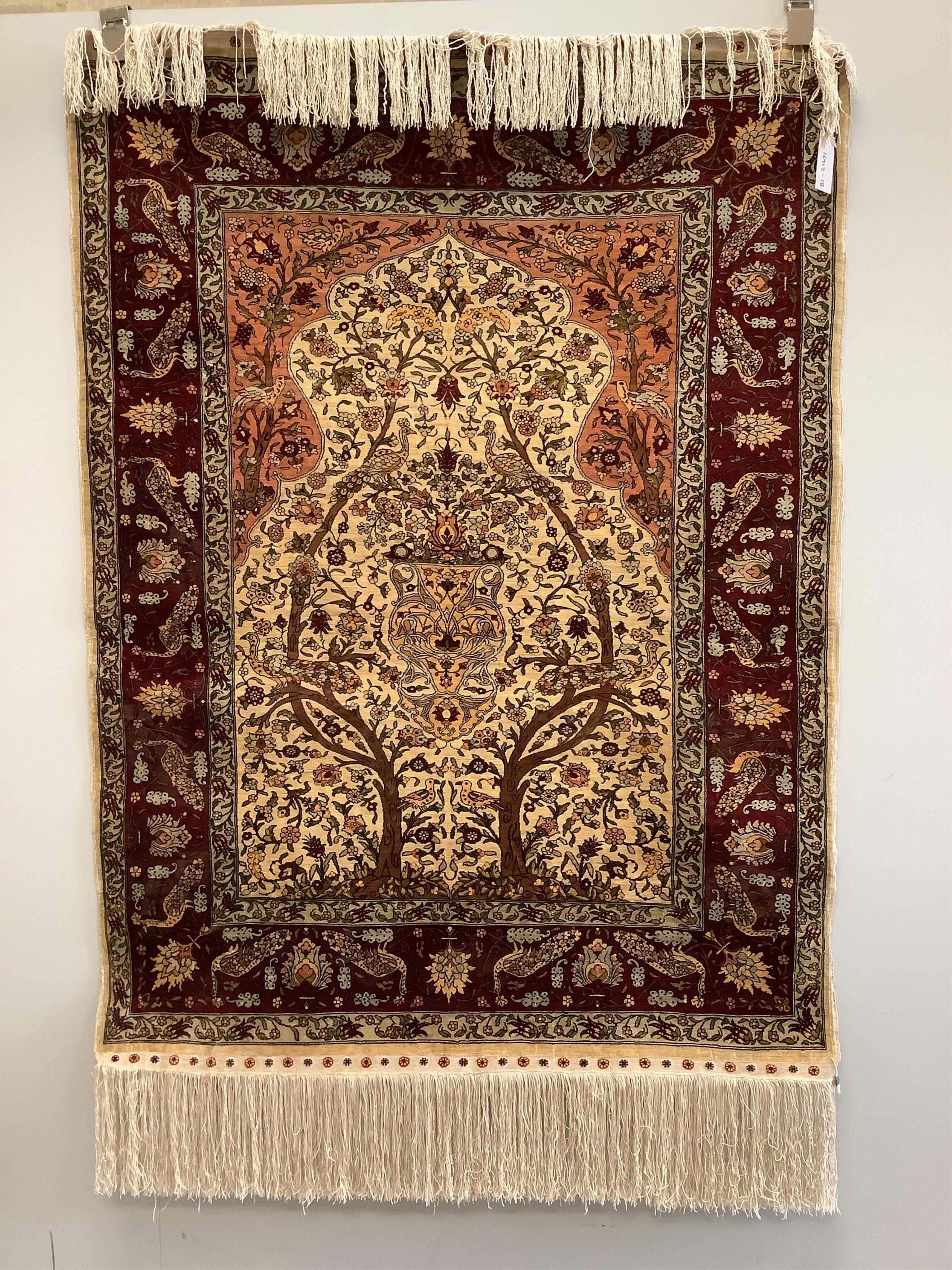 An Isfahan ivory ground part silk Tree of Life rug, 102 x 138cm. Condition - good